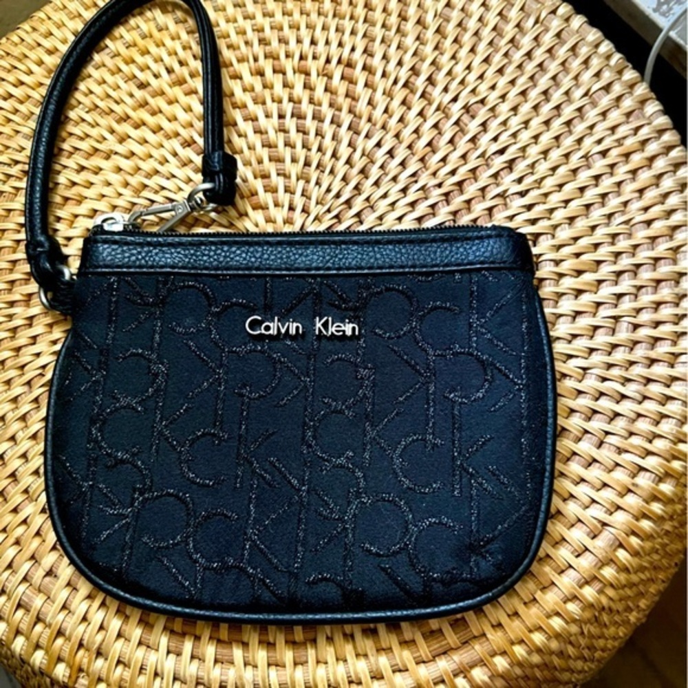 Calvin Klein black zip wristlet pouch with sparkly CK lettering